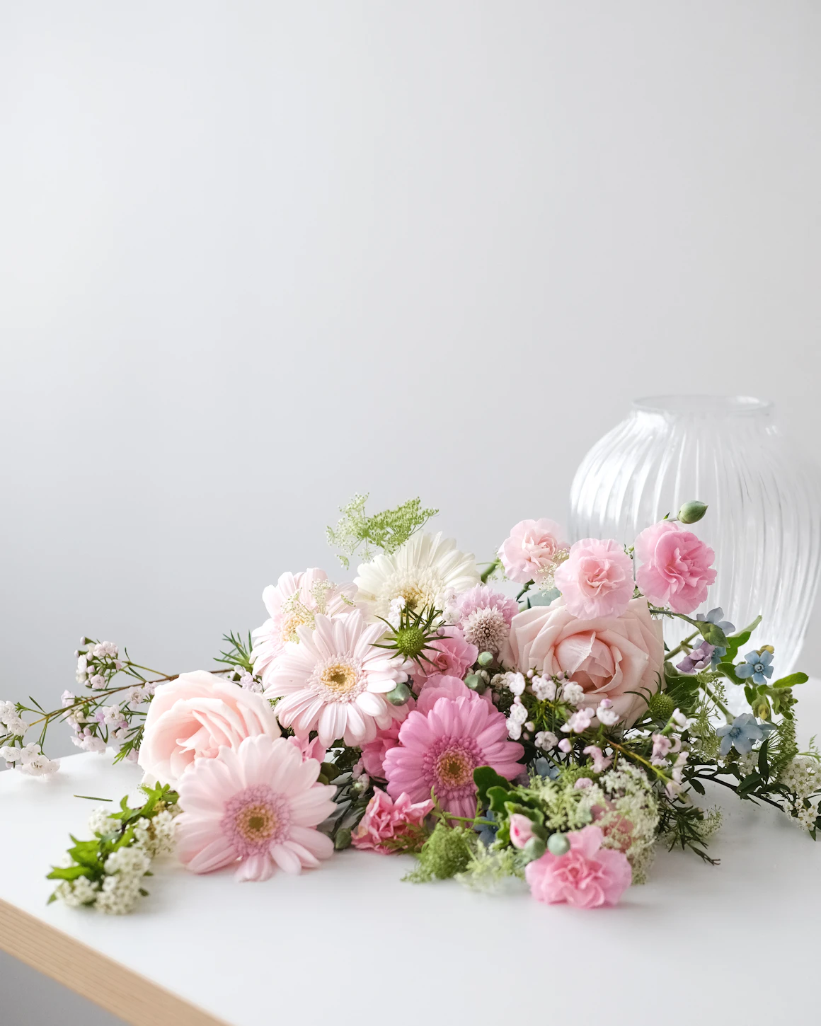 Editorial white and blush flowers in vase